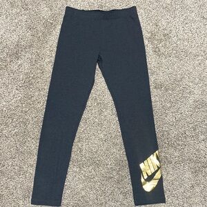 NIKE | NSW Metallic GX Leggings w/Gold Nike and Swoosh logo